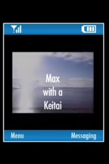 Max with a Keitai poster